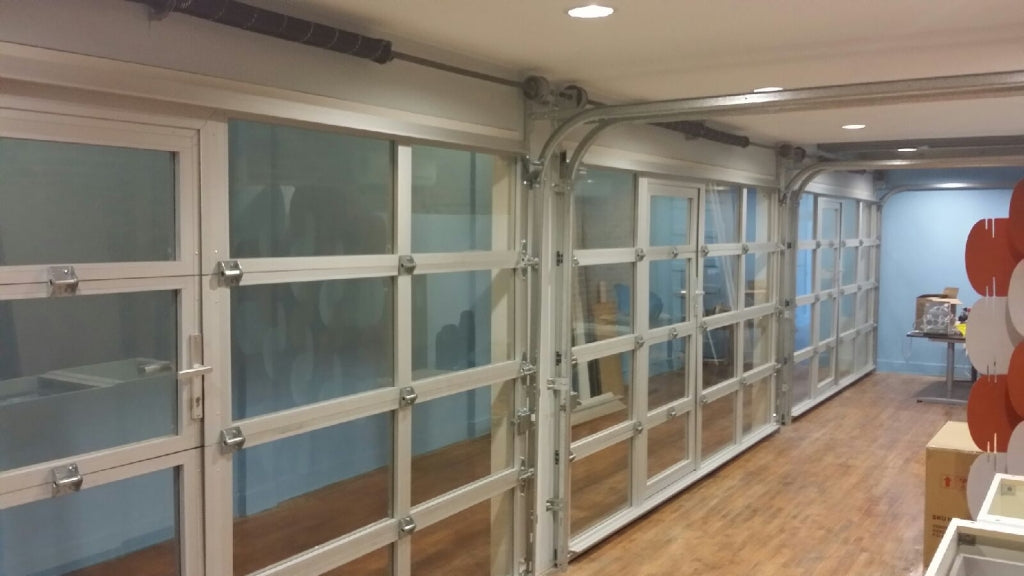 Contemporary Aluminum & Clear Tempered Glass Garage Door