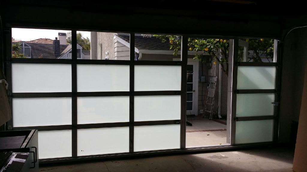 Contemporary Aluminum & Clear Tempered Glass Garage Door