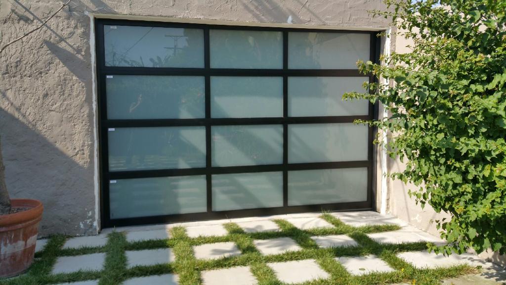 Contemporary Black Aluminum & White Laminate (Privacy) Glass Garage Door
