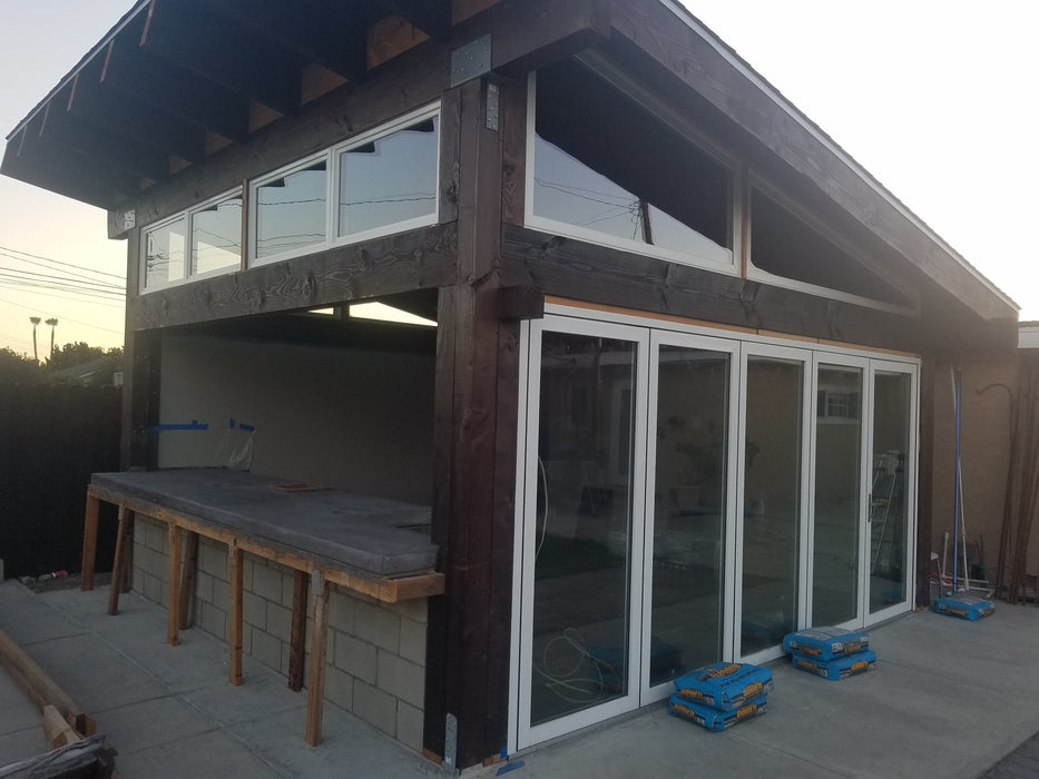 Contemporary Aluminum & Clear Tempered Glass Garage Door