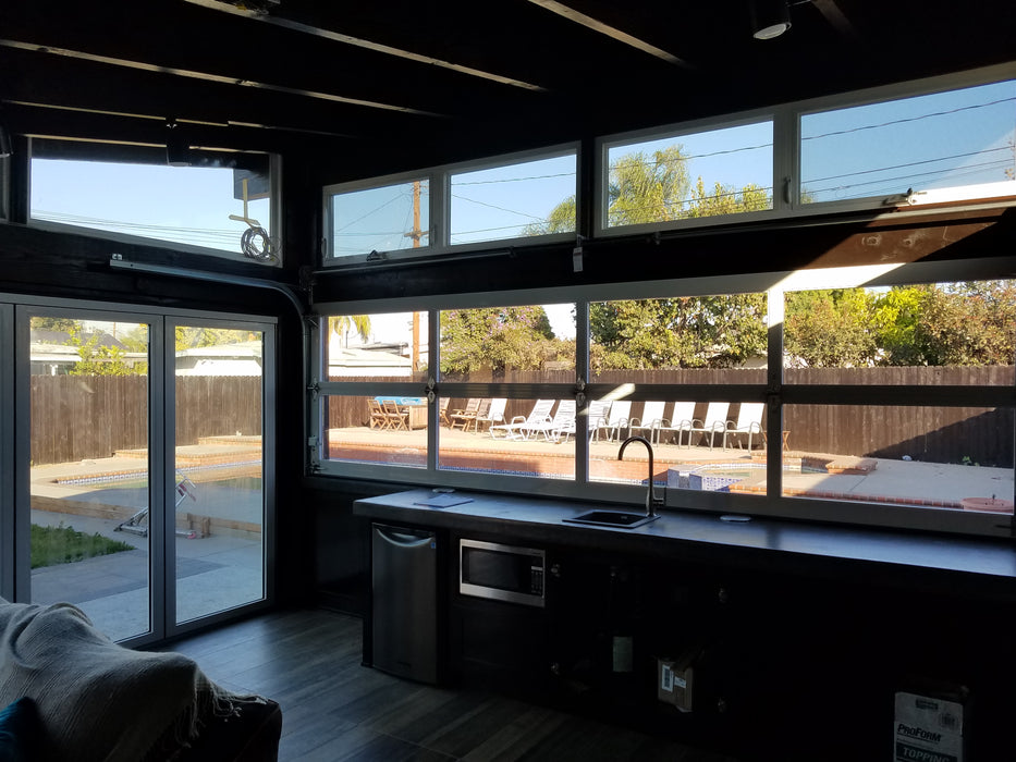 Contemporary Aluminum & Clear Tempered Glass Garage Door