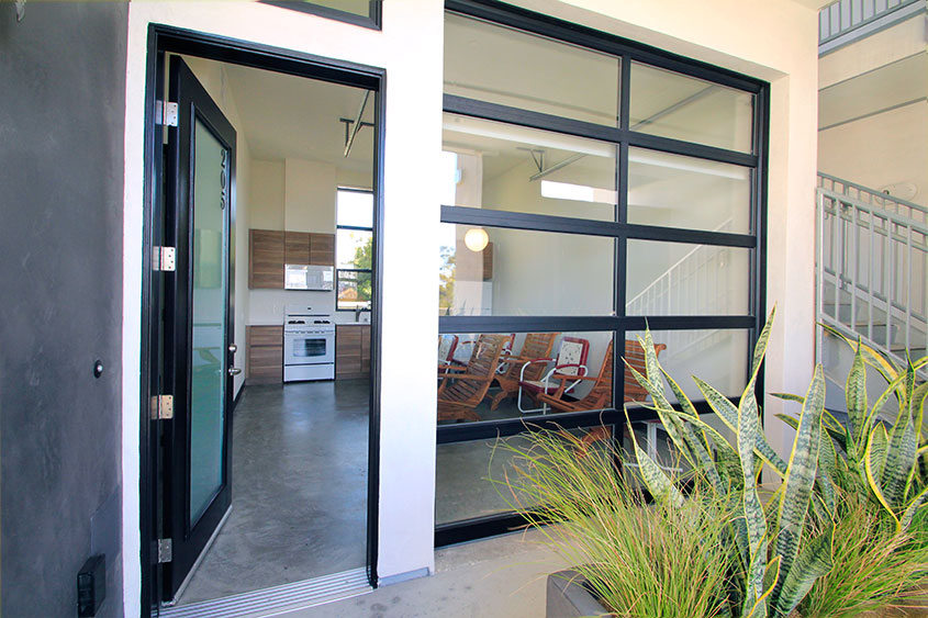 Contemporary Aluminum & Clear Tempered Glass Garage Door