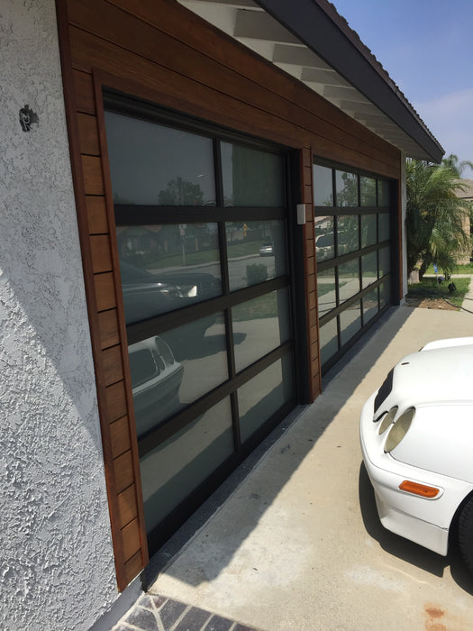 Contemporary Black Aluminum & White Laminate (Privacy) Glass Garage Door