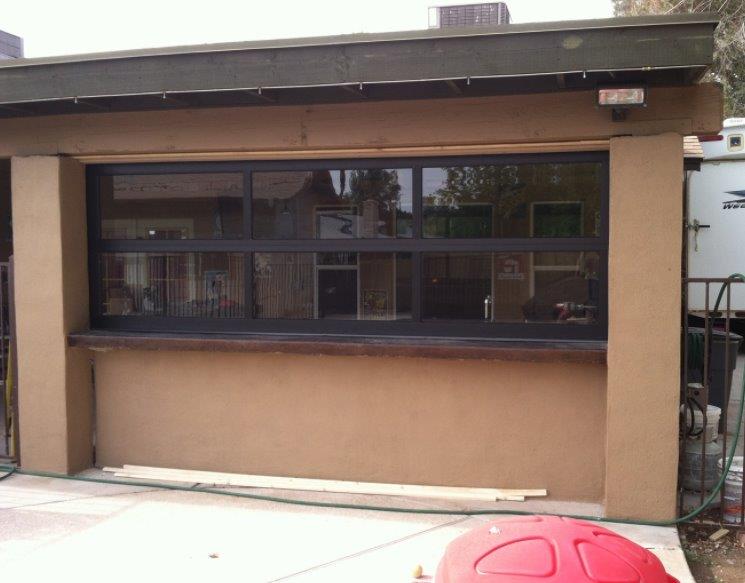 Contemporary Dark Bronze Aluminum & Clear Tempered Glass Garage Door