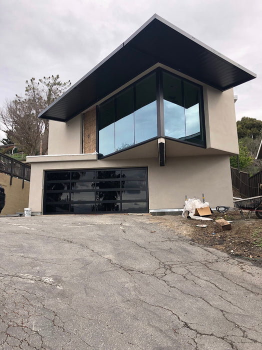 Contemporary Black Aluminum & Black Laminate (Privacy) Glass Garage Door