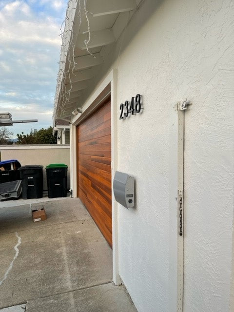 Cleo - Horizontal Grooves and Texture Steel Garage Door Modern Design