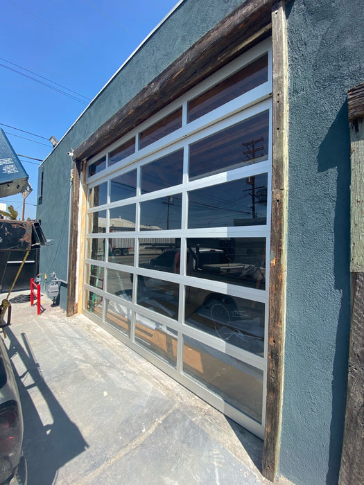 Contemporary Aluminum & Clear Tempered Glass Garage Door