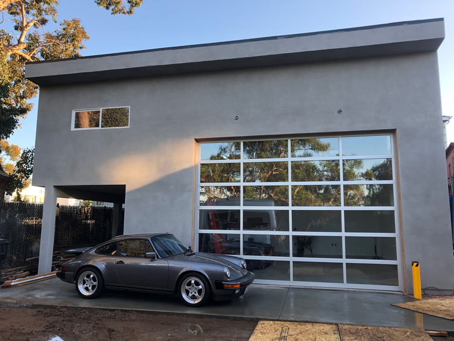 Contemporary Aluminum & Clear Tempered Glass Garage Door