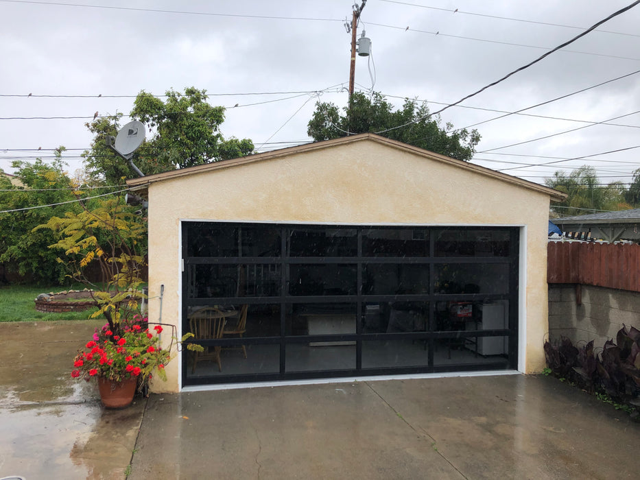 Contemporary Black Aluminum & Gray Tinted (See Through) Glass Garage Door