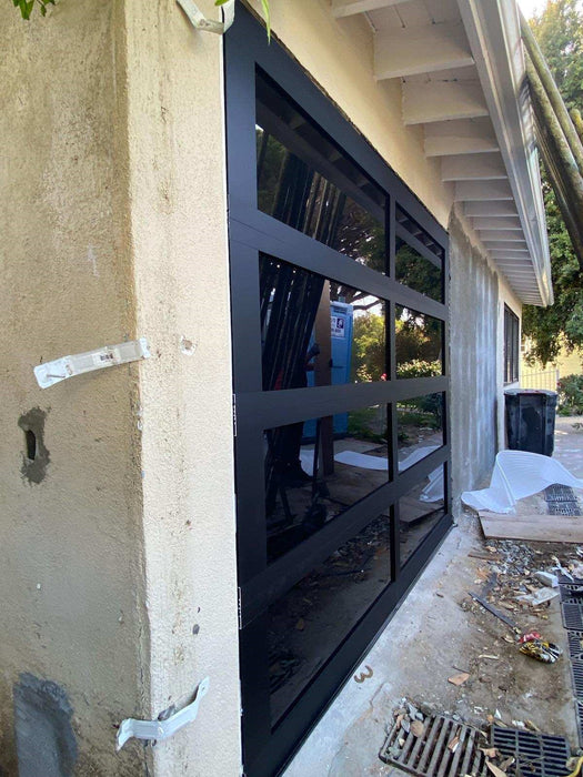 Contemporary Black Aluminum & Black Laminate (Privacy) Glass Garage Door