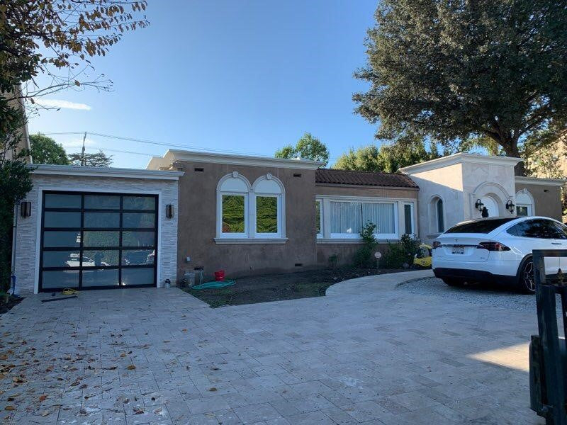 Contemporary Black Aluminum & White Laminate (Privacy) Glass Garage Door
