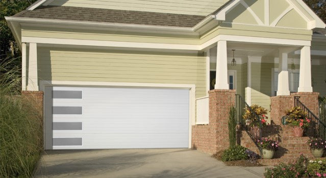 Mundo - Flush Panel Steel with a Natural Wood-Grain Texture Garage Door and Vertical Windows