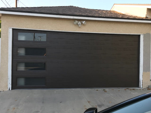 Mundo - Flush Panel Steel with a Natural Wood-Grain Texture Garage Door and Vertical Windows