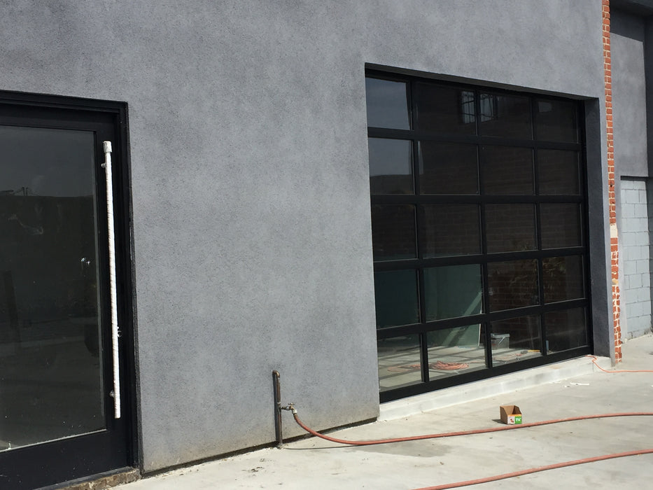 Contemporary Black Aluminum & Clear Tempered Glass Garage Door