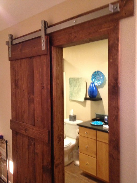 Marco - Rustic Unfinished 1-Panel V-Groove Knotty Alder Barn Door