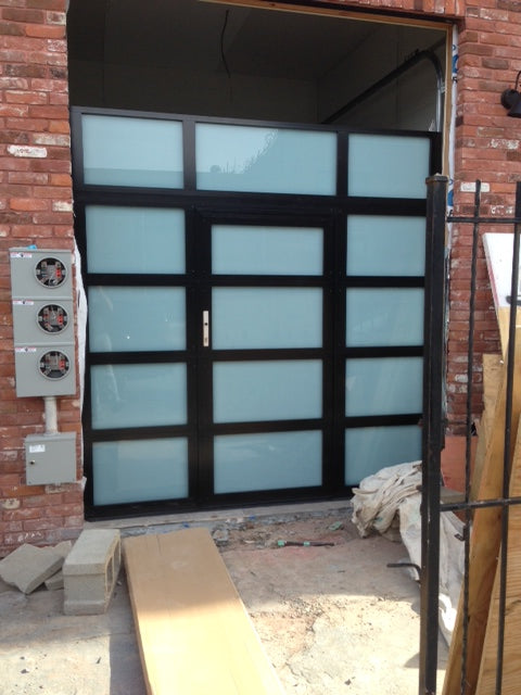 Contemporary Aluminum & Clear Tempered Glass Garage Door
