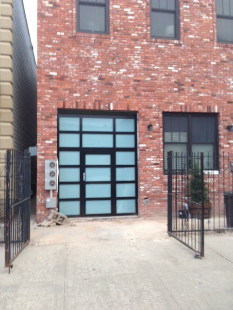Contemporary Aluminum & Clear Tempered Glass Garage Door