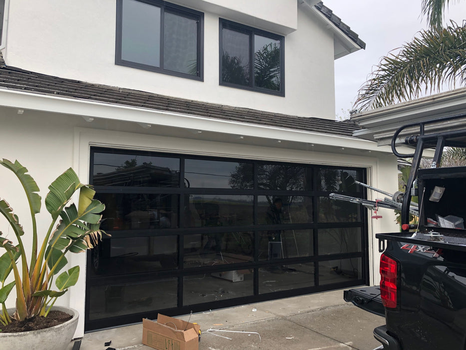 Ready to Ship: [9' x 8'] Contemporary Black Aluminum & 1/2" Insulated Grey Tinted Tempered Glass Garage Door Including Free Shipping $4,995.00