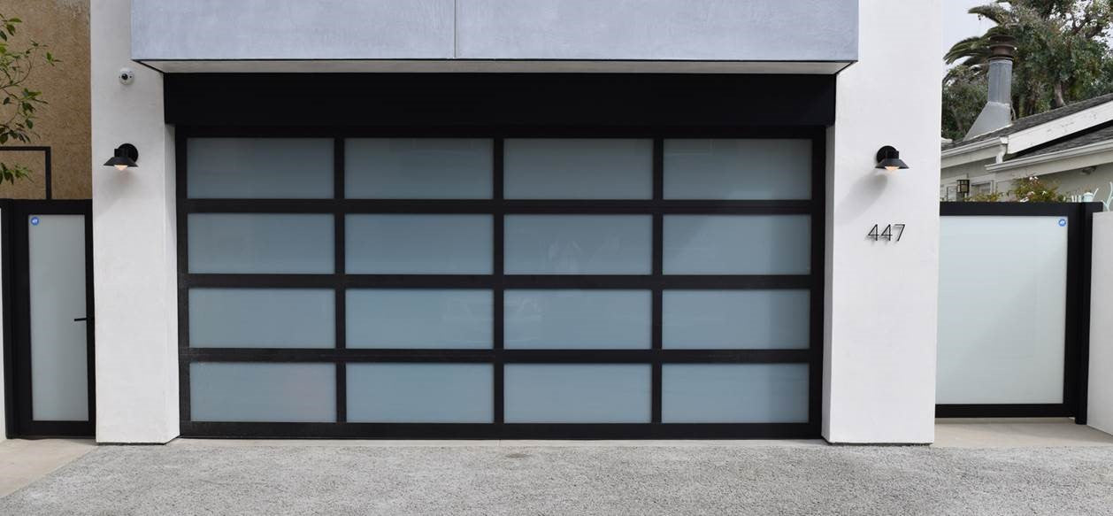 Contemporary Black Aluminum & White Laminate (Privacy) Glass Garage Door