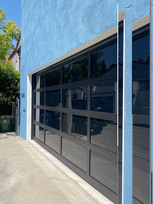 Contemporary Black Aluminum & Black Laminate (Privacy) Glass Garage Door