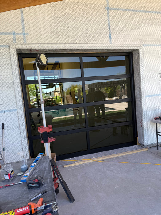 Contemporary Black Aluminum & Gray Tinted (See Through) Glass Garage Door