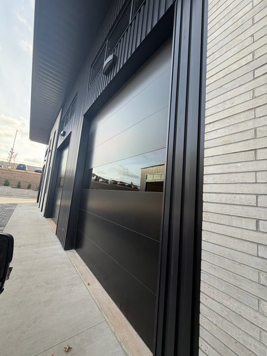 Infinity - Flush Panel Smooth Steel Garage Door with Horizontal Modern Glass Design