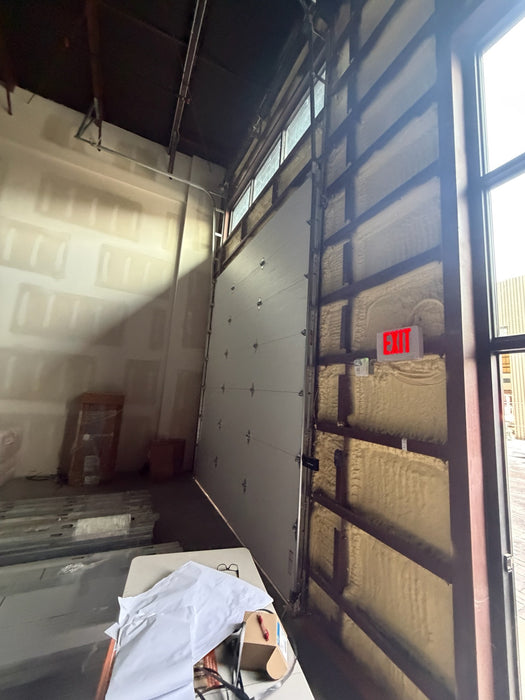 Infinity - Flush Panel Smooth Steel Garage Door with Horizontal Modern Glass Design