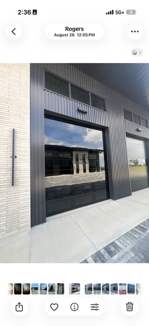 Infinity - Flush Panel Smooth Steel Garage Door with Horizontal Modern Glass Design