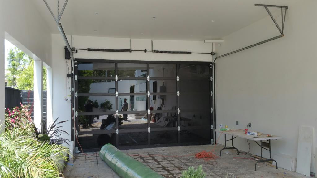 Contemporary Black Aluminum & Black Laminate (Privacy) Glass Garage Door