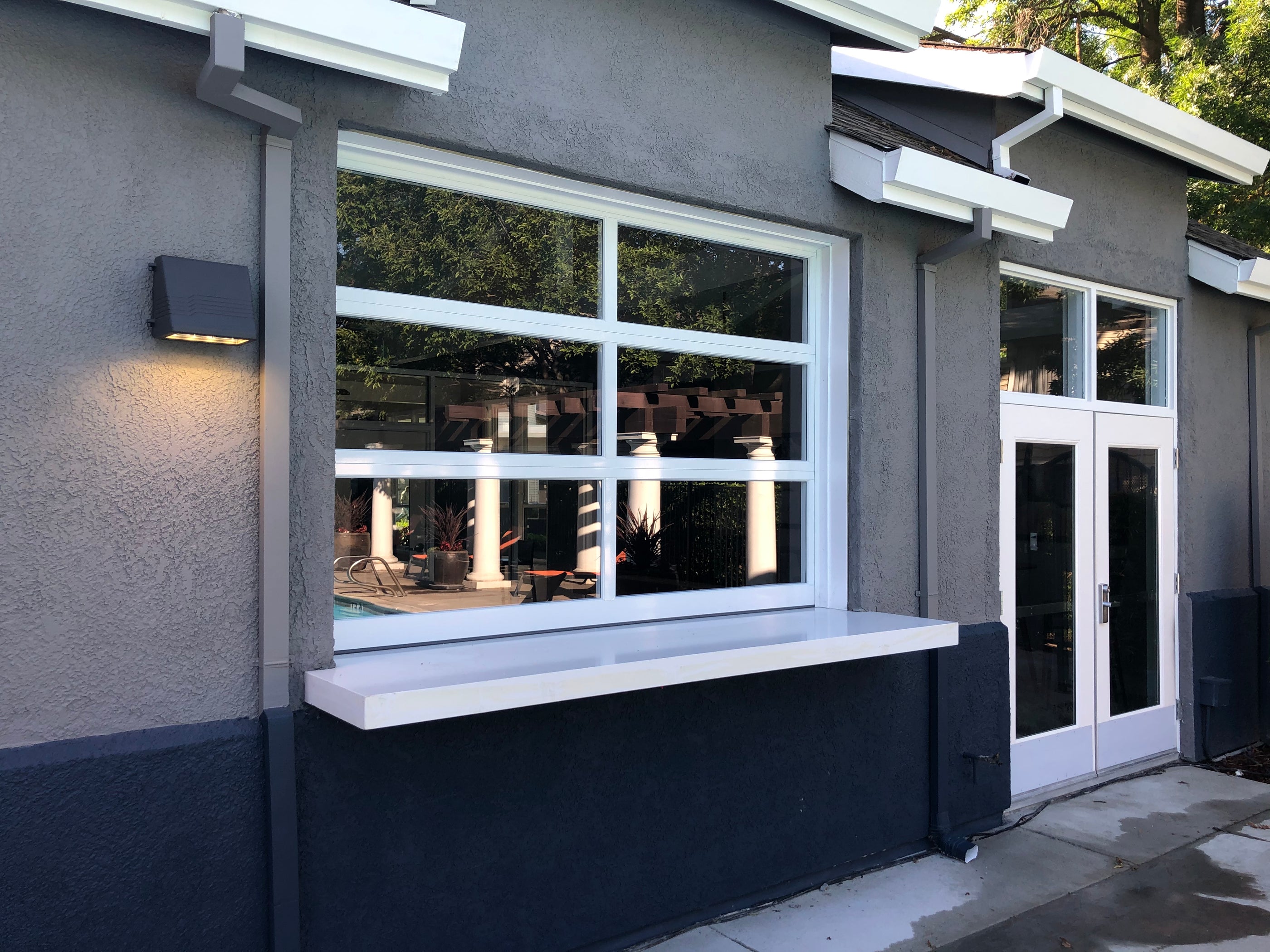 Bar & Restaurant Glass Garage Doors — Lux Garage Doors