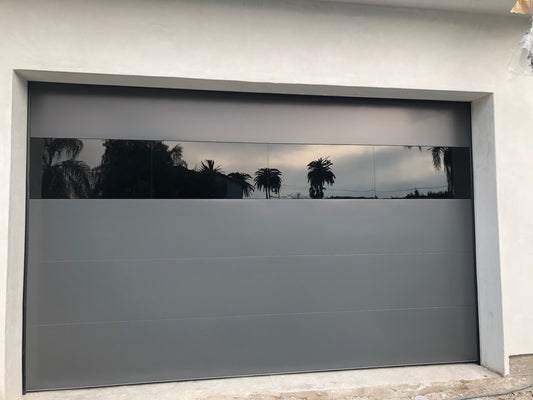 Infinity - Flush Panel Smooth Steel Garage Door with Horizontal Modern Glass Design