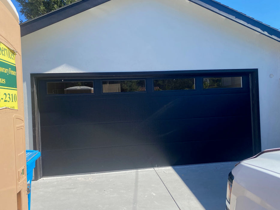 Noir - Flush Panel Insulated Steel with a Natural Wood-Grain Texture Garage Door Black Color